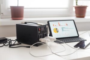 Charging station for phone tablet laptop and other gadgets when there is no light during blackout